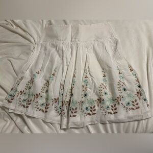 Embroidered White Skirt with Floral Accents